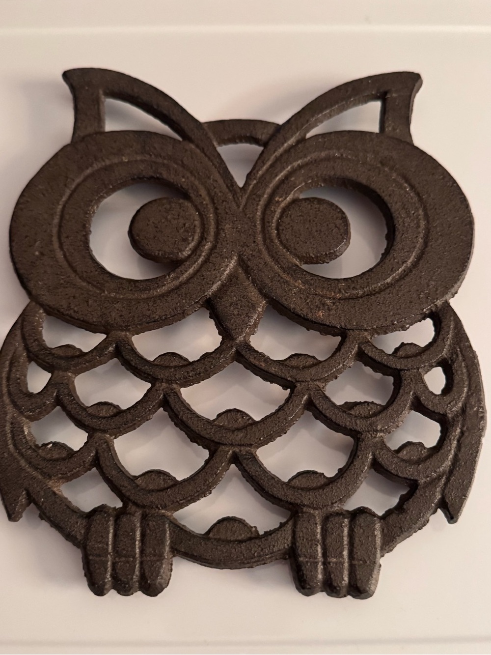 Cast iron trivet, owl